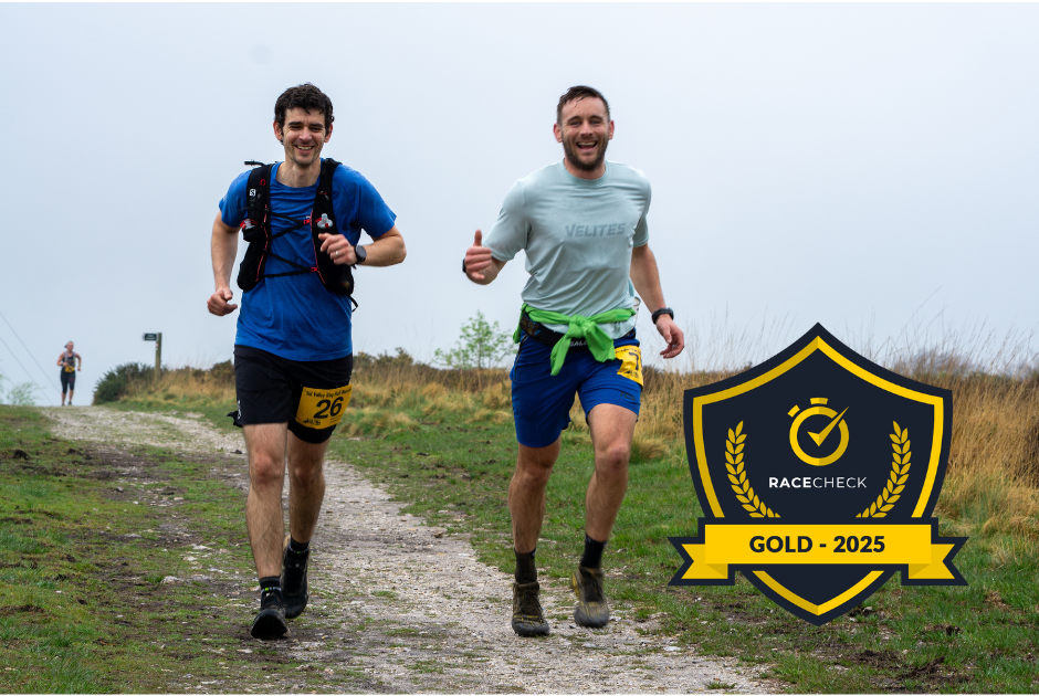 An image of two men jogging on a trail